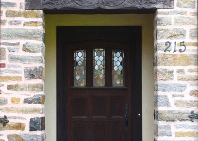 Brighton, NY, Houston Barnard Neighborhood, Unusual stone exterior with earthtone hued palette, paneled door and rare leaded glass window panes