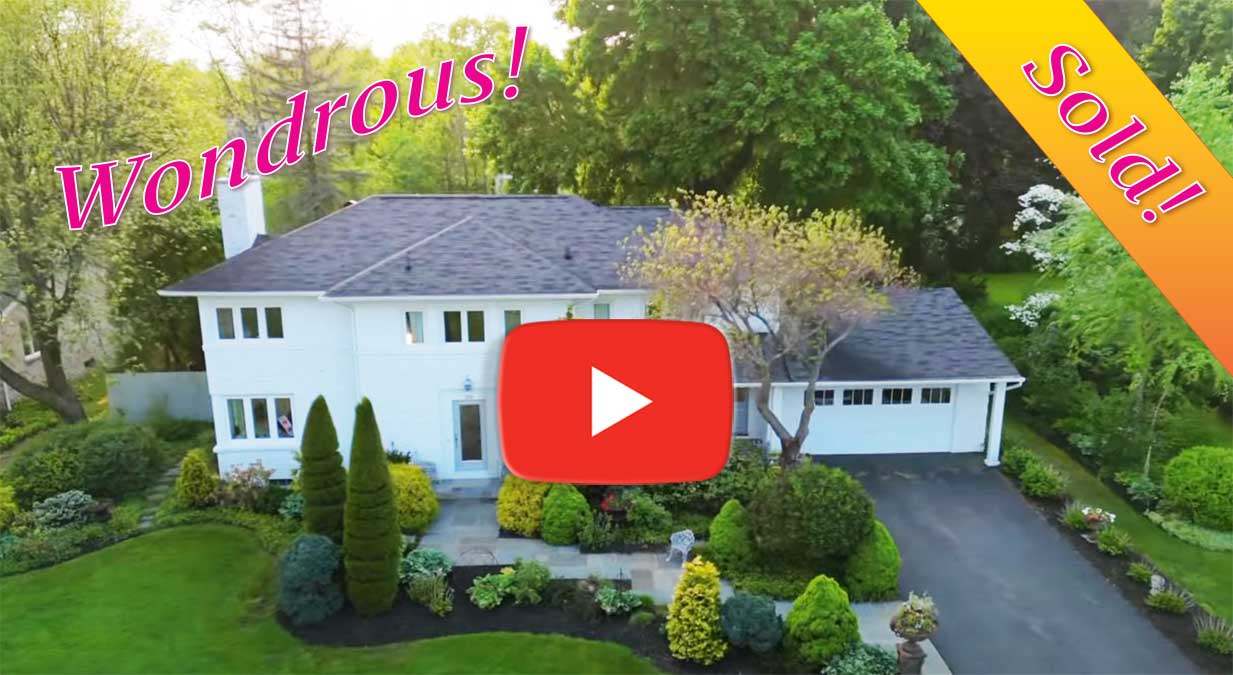 aerial view of property at 256 Sandringham Road, Brighton, NY, with YouTube link to video